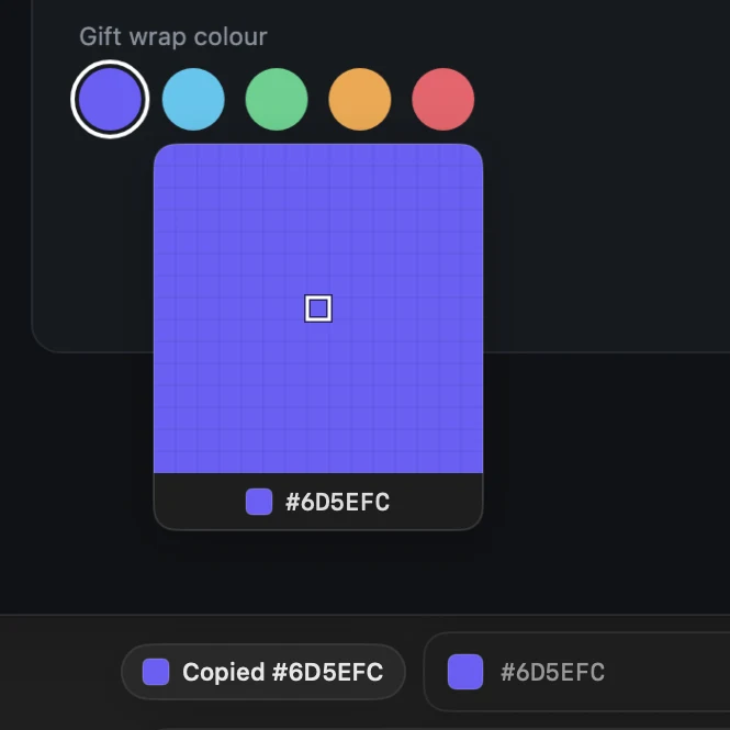 The colour picker over a gift wrap swatch, reading #6D5EFC and copying it.